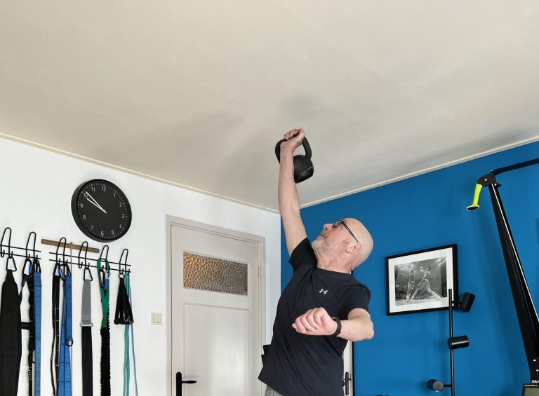 One arm kettlebell clean and press